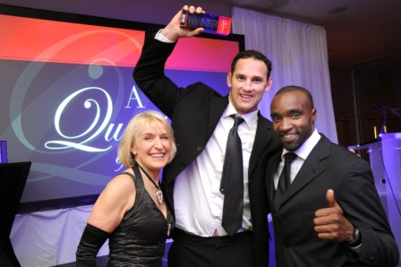 656219-4 : ©Lionel Heap : News : A Question of Brains Charity Event in Aid of Steps : Winner 2012.... A Question of Brains winner representing his table Leicester Tigers star Craig Newby (centre) collects the trophy from event organiser and Steps patron Rosemary Conley (left) & special guest freerunning founder Sebastian Foucan (right).