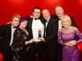656410-03 : @Lionel Heap : News : A Question of Brains 2015 Charity Dinner in AId of Steps Conductive Education Centre in Shepshed : 2015 A Question of Brains Champions, The Healy Group L-R Sam Beales, Laura Beales, Gareth Healy, Mark Powell, Anthony Healy and Steps patron Rosemary Conley. The event raied £75,000 for Steps.