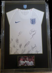 A FRAMED, SIGNED SHIRT FROM THE ENGLAND NATIONS CUP SEMI-FINAL SQUAD 2019