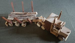 3. Unique and magnificent hand-made wooden toy truck with trailer.